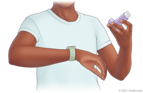 Person holding breath while looking at watch. Person holding breath while looking at watch.